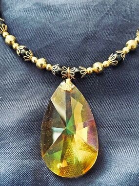 NECKLACE LARGE PEAR CRYSTAL YELLOW WITH BLACK BEADS & GOLD TONE BEADS AND TUBES,